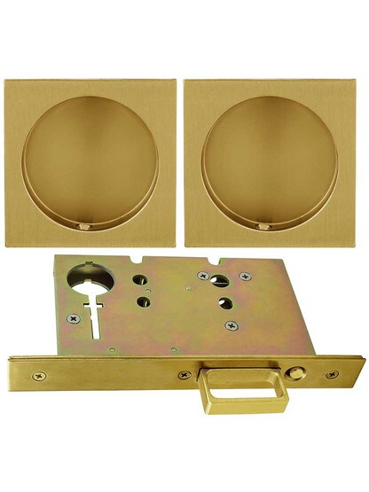 Premium Pocket-Door Mortise Lock Set with Square Pulls in Aged Brass.